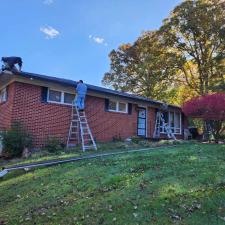 Residence-Roofing-Restoration-Transforms-Home-with-Dark-Bronze-Gutters-and-Gutter-Guards-in-Erwin-TN 9